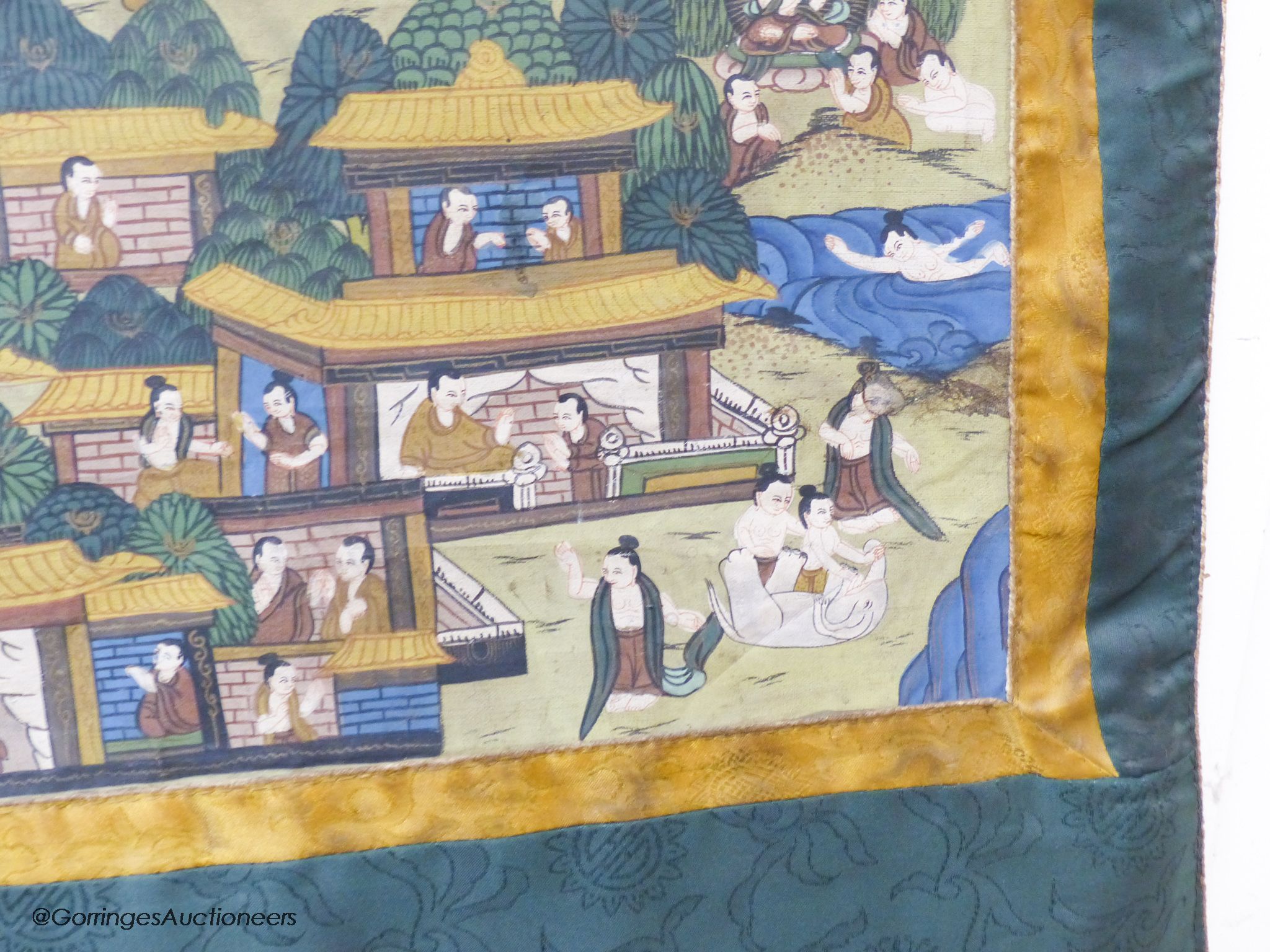 A thangka, 82 x 57cm excluding green backing cloth